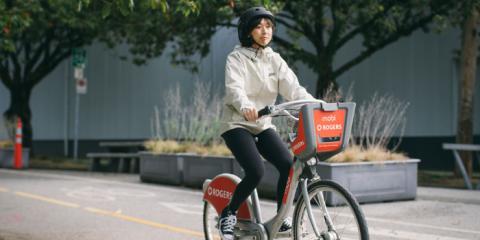 Person riding a bike share 